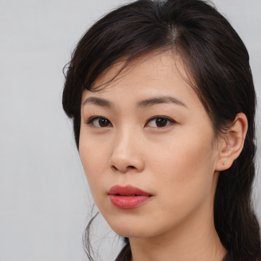 Neutral asian young-adult female with long  brown hair and brown eyes