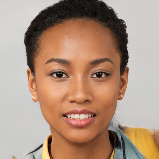 Joyful latino young-adult female with short  brown hair and brown eyes