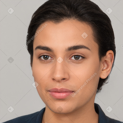 Joyful latino young-adult female with medium  brown hair and brown eyes