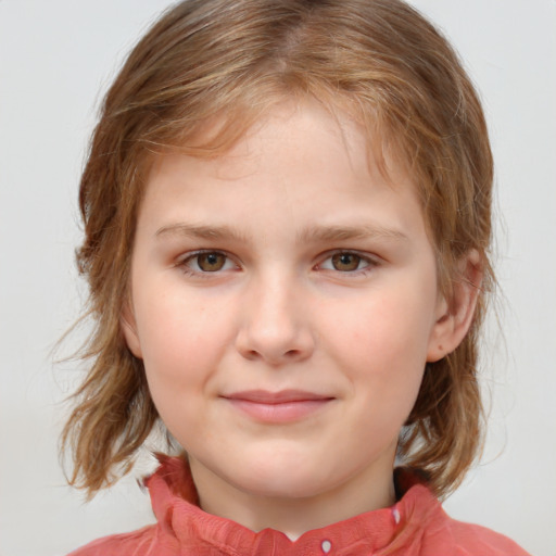 Joyful white child female with medium  brown hair and blue eyes