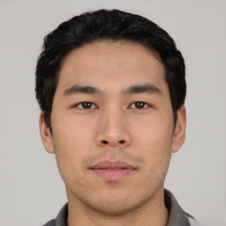 Neutral asian young-adult male with short  black hair and brown eyes