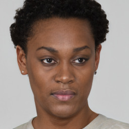 Neutral black young-adult female with short  black hair and brown eyes