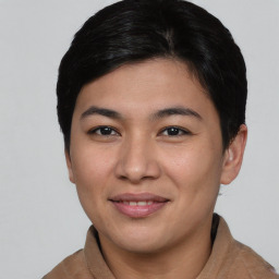 Joyful asian young-adult female with short  brown hair and brown eyes