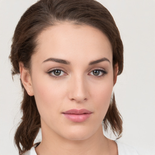 Neutral white young-adult female with medium  brown hair and brown eyes