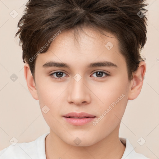 Joyful white child male with short  brown hair and brown eyes