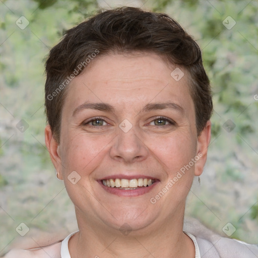 Joyful white adult female with short  brown hair and brown eyes