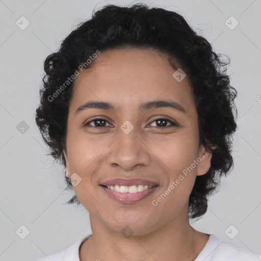 Joyful latino young-adult female with short  brown hair and brown eyes