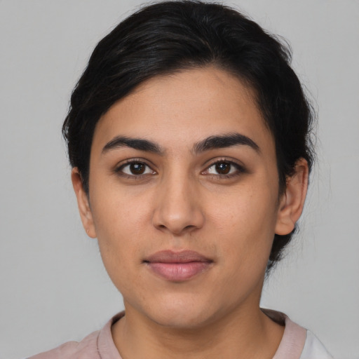 Neutral latino young-adult female with short  black hair and brown eyes