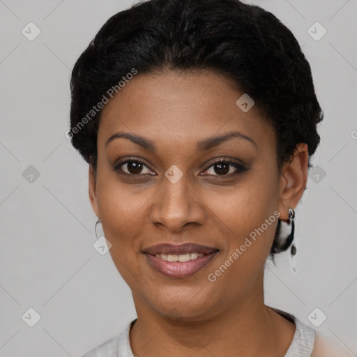 Joyful latino young-adult female with short  black hair and brown eyes