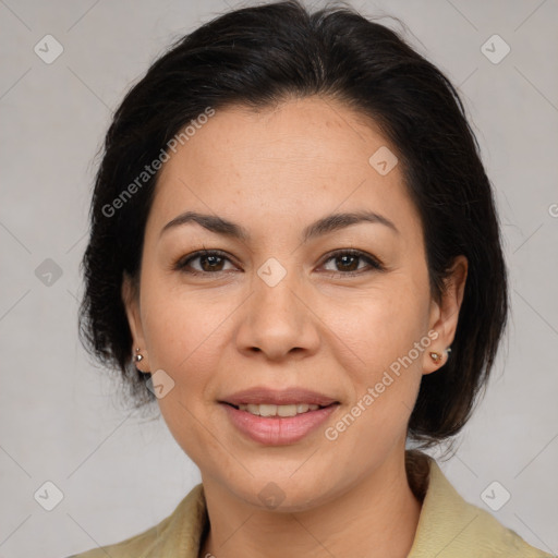 Joyful latino adult female with medium  brown hair and brown eyes