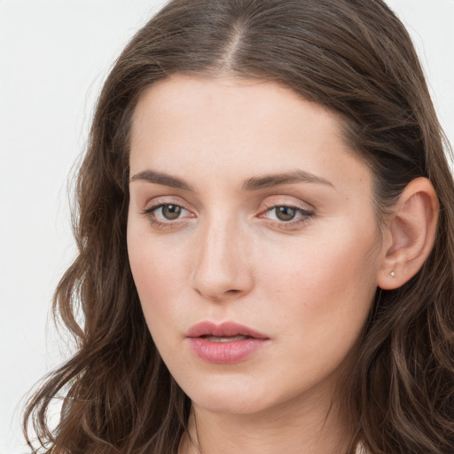 Neutral white young-adult female with long  brown hair and grey eyes