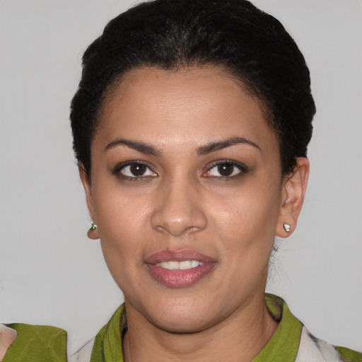 Joyful white young-adult female with short  black hair and brown eyes