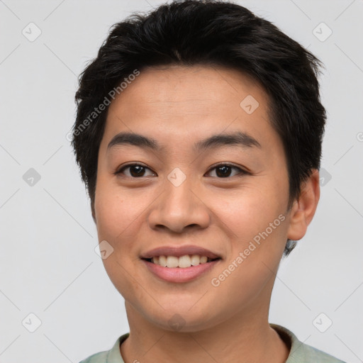 Joyful asian young-adult male with short  brown hair and brown eyes