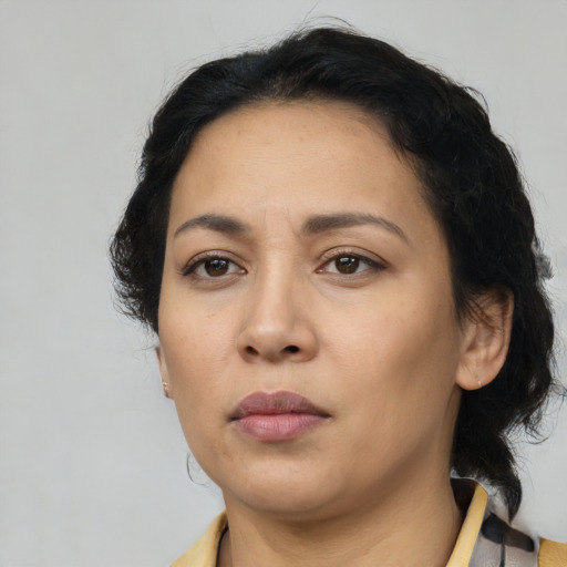 Neutral asian adult female with medium  brown hair and brown eyes