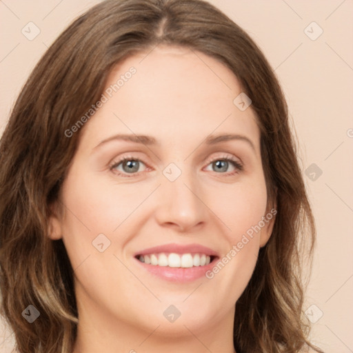 Joyful white young-adult female with long  brown hair and green eyes