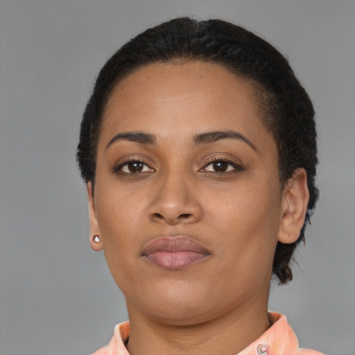 Neutral latino young-adult female with short  brown hair and brown eyes