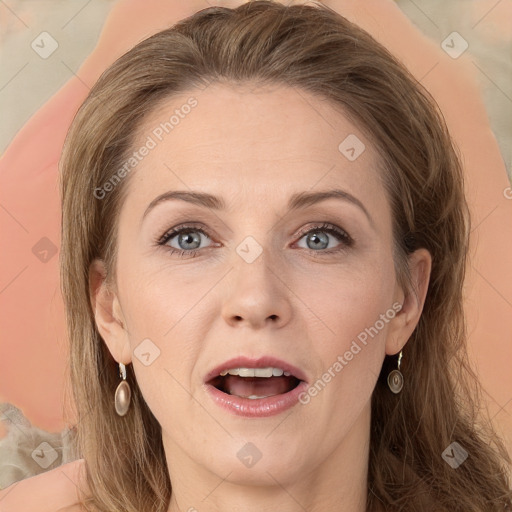 Joyful white adult female with long  brown hair and grey eyes