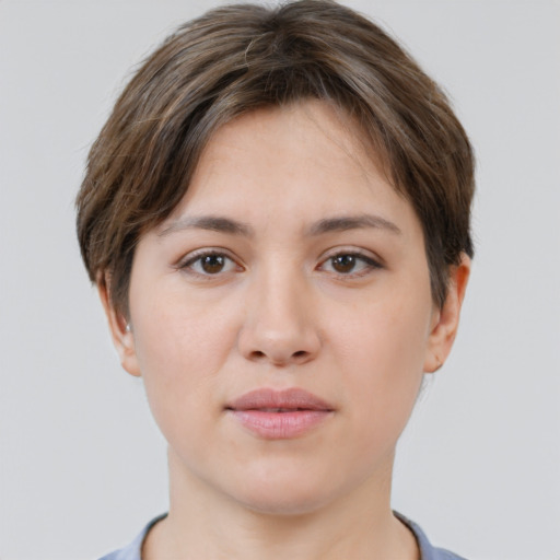 Neutral white young-adult female with short  brown hair and brown eyes