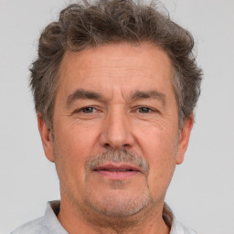 Neutral white middle-aged male with short  brown hair and brown eyes