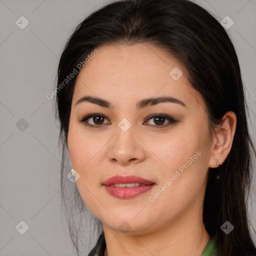 Joyful asian young-adult female with long  brown hair and brown eyes