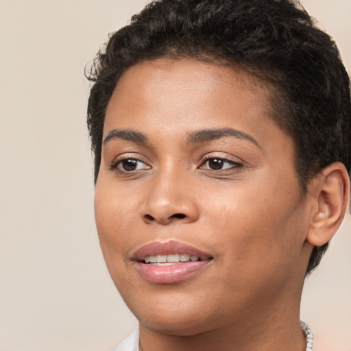 Joyful white young-adult female with short  brown hair and brown eyes