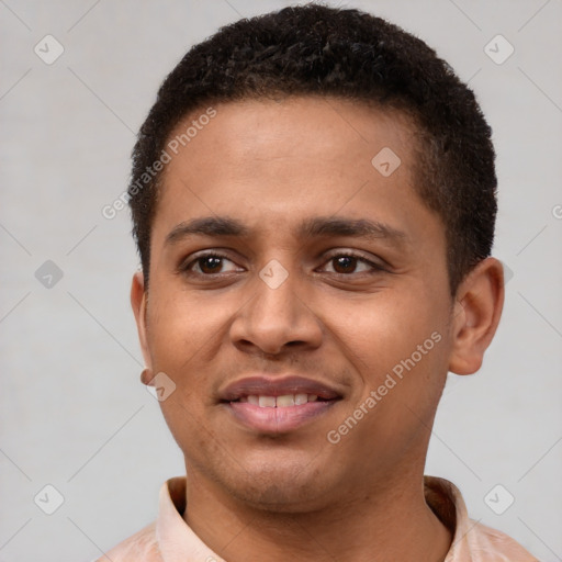 Joyful latino young-adult male with short  brown hair and brown eyes