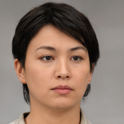Neutral asian young-adult female with medium  brown hair and brown eyes