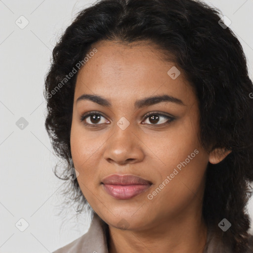 Joyful latino young-adult female with long  black hair and brown eyes