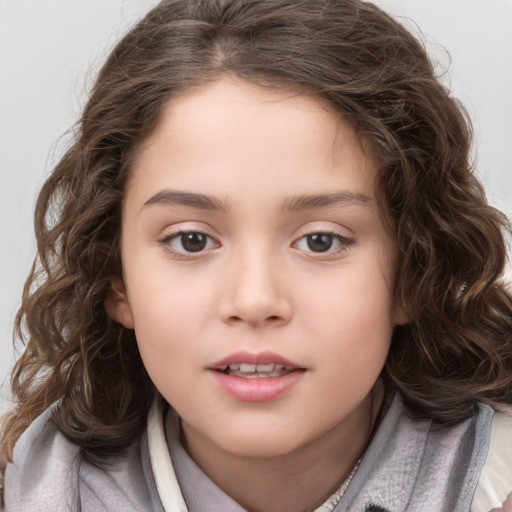 Joyful white child female with medium  brown hair and brown eyes