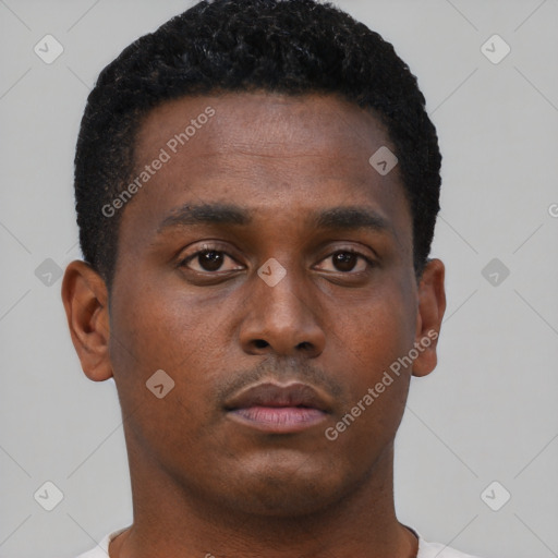 Neutral black young-adult male with short  brown hair and brown eyes