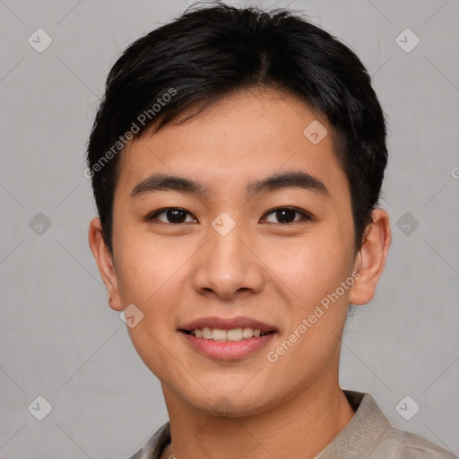 Joyful asian young-adult male with short  black hair and brown eyes