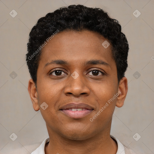 Joyful black young-adult male with short  black hair and brown eyes