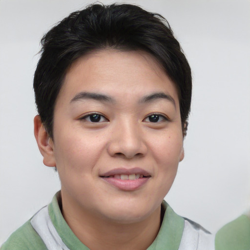 Joyful asian young-adult female with short  brown hair and brown eyes