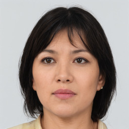 Neutral asian young-adult female with medium  brown hair and brown eyes