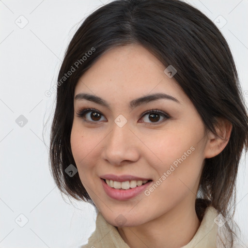 Joyful white young-adult female with medium  brown hair and brown eyes