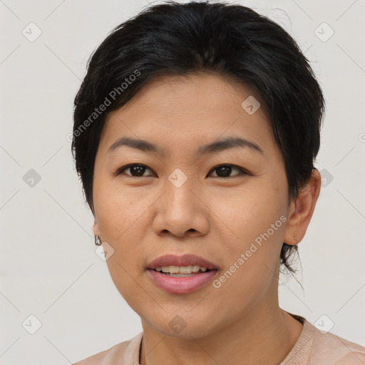 Joyful asian young-adult female with short  black hair and brown eyes