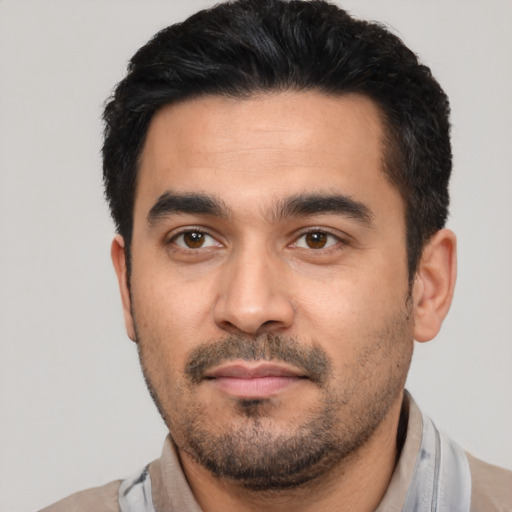 Neutral latino young-adult male with short  black hair and brown eyes