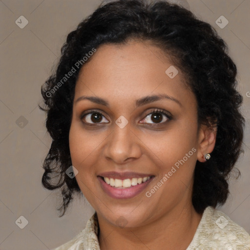 Joyful black young-adult female with medium  brown hair and brown eyes