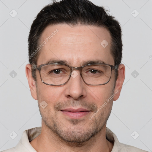 Joyful white adult male with short  brown hair and brown eyes