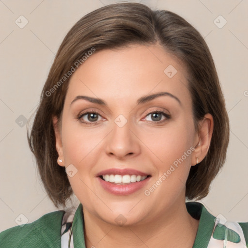 Joyful white young-adult female with medium  brown hair and green eyes