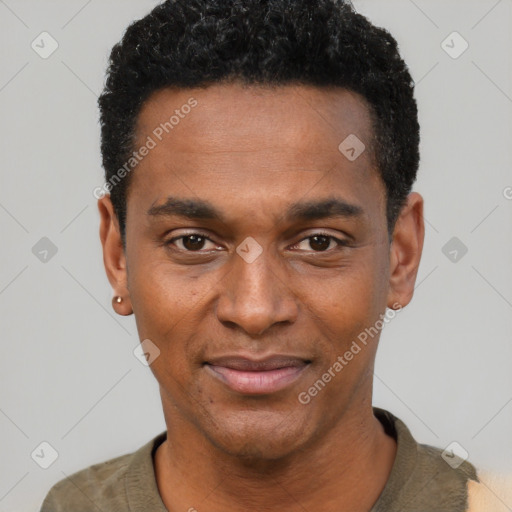 Joyful black young-adult male with short  black hair and brown eyes