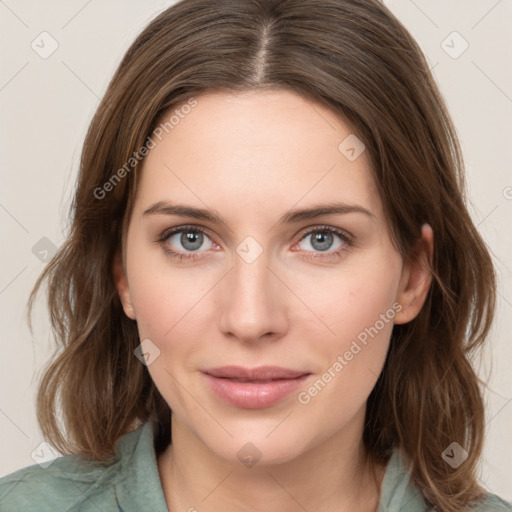 Joyful white young-adult female with medium  brown hair and green eyes