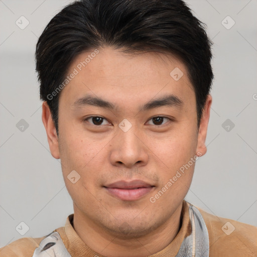 Joyful asian young-adult male with short  brown hair and brown eyes