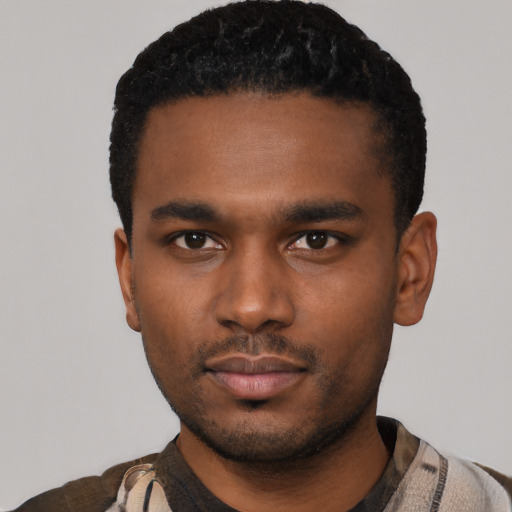 Neutral black young-adult male with short  black hair and brown eyes