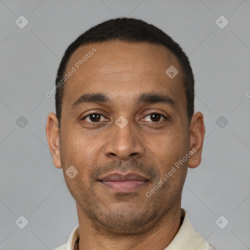 Neutral latino adult male with short  black hair and brown eyes