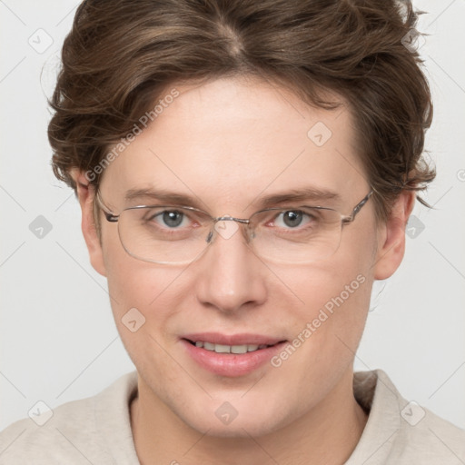 Joyful white adult female with short  brown hair and grey eyes