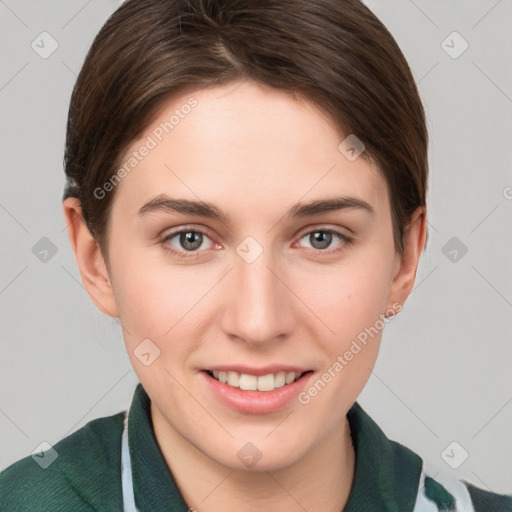 Joyful white young-adult female with short  brown hair and grey eyes