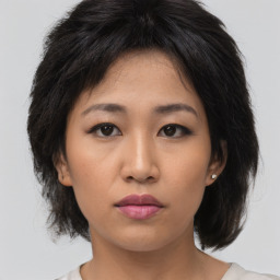 Neutral asian young-adult female with medium  brown hair and brown eyes