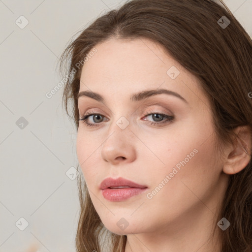 Neutral white young-adult female with long  brown hair and grey eyes