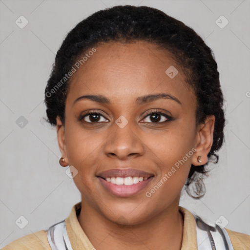 Joyful latino young-adult female with short  black hair and brown eyes